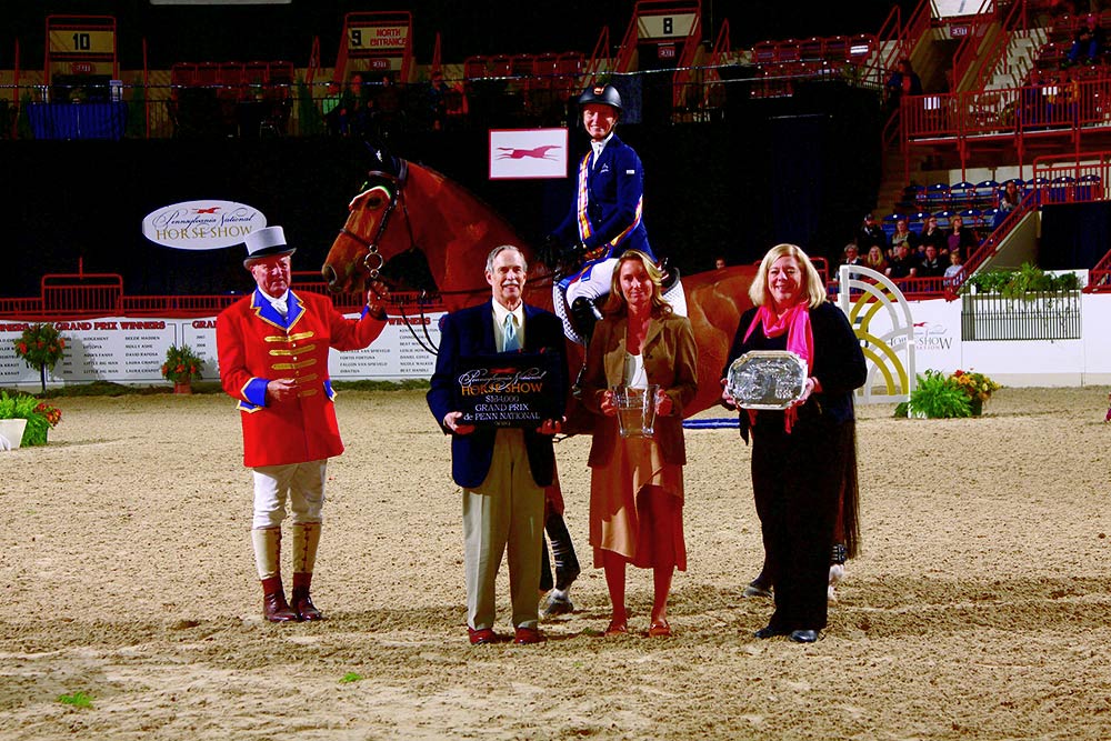 Molly Ashe Crawley winning the Grand Prix de Penn National at the 2019 Pennsylvania National Horse Show